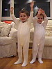 Twins wearing rompers.